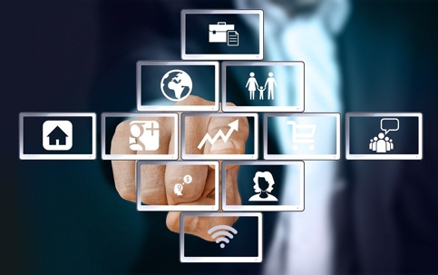 person selecting icons on a grid